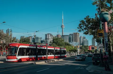Toronto streetcar with the CN Tower behind